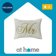 an embroidered pillow with the words,'mr and mrs'in gold on it