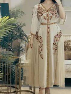 Introducing our exquisite Chiffon Embroidery Long Sleeve Abaya, a sophisticated garment perfect for Ramadan and Eid celebrations. Crafted from lightweight chiffon fabric, this abaya offers both elegance and comfort for the modern Muslim woman. The intricate embroidery detailing adds a touch of refinement and cultural flair, making it a standout piece for special occasions.Designed with modesty and style in mind, this long sleeve abaya is versatile enough to be worn for a variety of events. Wheth Chiffon Evening Dresses, Muslim Dress, Evening Dress Fashion, Full Dress, Women's Evening Dresses, Evening Dresses Elegant, Prom Party Dresses, Mode Style, Types Of Skirts