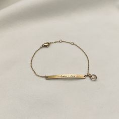 This is a personalized bracelet with birthstone. You can engrave 2 names connected with heart on bracelet.   - Bar size : 40mm x 3mm  - Bithstone : 6mm  - Bracelet length : 6.0" ~ 7.0"   It will be the best gift to show your love for your family and friends. This will be packed and delivered with cute small box. How to order: 1. choose the birthstone from menu 2. Enter 2 names on personalization  If you have any questions, please feel free to contact me. Thank you. Personalized Adjustable Metal Chain Bracelet, Minimalist Custom Name Metal Jewelry, Minimalist Metal Bracelets For Mother's Day, Personalized Metal Bracelets For Mother's Day, Personalized Metal Name Bracelet As Gift, Personalized Metal Name Bracelet Gift, Rose Gold Stainless Steel Promise Jewelry, Minimalist Stainless Steel Name Bracelet, Gold Custom Name Bracelet In Stainless Steel