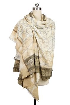 The charm of our Ecru Multi Golden Scarf cannot be beat! Featuring a pattern that reminds one of stunning stained glass printed over cotton, this piece is graced with opulent golden hues. Wear it as a scarf for a trendy look or a wrap for over-the-shoulder elegance. Materials: Cotton Size: 28" x 78" Made in India Bohemian Gold Shawl Scarves, Golden Scarf, Blanched Almonds, A Pattern, Scarf Wrap, Stained Glass, Almond, Glass, Pattern