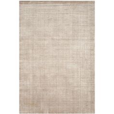 a beige rug with an uneven design