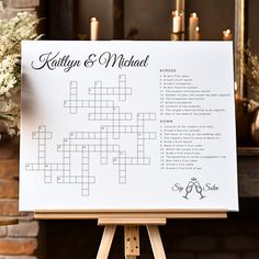 a crossword puzzle is displayed on an easel in front of a fire place