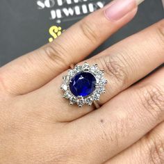 -IN STOCK, ready for shipping via UPS EXPRESS (free shipping). ENJOY OUR WORRY-FREE SERVICE AND THE DAZZLING, GENUINE JEWELRY WE DESIGN AND HANDCRAFT WITH LOVE❤️ ABOUT THE ITEM: OMG, when our goldsmith showed me this ring right after completion, I literally screamed! This GORGEOUS, natural 4.60 TCW BLUE SAPPHIRE, PRINCESS DIANA's Style ring is just so beautiful! EXTREMELY STUNNING! With a 3.36 carats Certified HEATED, CEYLON, BLUE SAPPHIRE. This ring offers an important statement of who you are Sapphire Cluster Ring For Formal Occasions, Dazzling Gia Certified Sapphire Wedding Ring, Formal Sapphire Cluster Ring With High Clarity, Exquisite Sapphire Ring With Vvs Clarity For Wedding, Formal White Gold Diamond Ring With Lab-created Sapphire, Elegant Lab-created Sapphire Wedding Jewelry, Elegant Wedding Rings With Lab-created Sapphire, Sapphire Diamond Ring For Wedding, Gia Certified, Gia Certified Silver Rings With Lab-created Sapphire