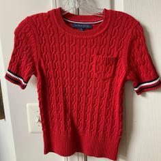 Brand New Without Tags Tommy Hilfiger Red Short Sleeve Knit Sweater. Never Worn. Purchased At Macy’s. Cozy Red Tops For Spring, Trendy Textured Knit Red Tops, Trendy Red Crew Neck Knit Top, Red Knitted Casual Tops, Red Cable Knit Tops, Cozy Fitted Red Tops, Cozy Red Fitted Tops, Red Short Sleeve Tops For Winter, Cozy Red Cotton Tops