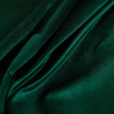 the green fabric is very soft and shiny