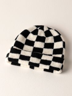 Spruce up your cold weather accessories in Shiraleah's Tanner Hat. This hat features a cozy knit texture in a checkered black and white design, making it the perfect addition to any winter outfit. Made from nylon, the Tanner Hat will keep you cozy and chic during the cold winter months. Pair it with other Shiraleah accessories to complete your winter look! Color: Black One Size Nylon Made In China Vegan 06-28-011Blk White Acrylic Hat For Fall, Black Acrylic Hats For Cold Weather, Black Acrylic Hats For Fall, Black Acrylic Hat For Fall, Warm Black Acrylic Hat, Cozy Black Hat, One Size Fits Most, Cozy Black Hats For Cold Weather, Cozy Black Beanie Cap, Cozy Black Hat One Size Fits Most