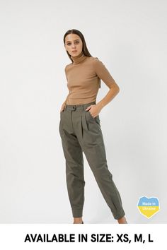 "Pleated pants combine mid-rise and comfortable loose cut. They fit perfectly different body shapes and heights and visualize our unusual vision on basic pants. You could easily and quickly create an incredibly comfy and stylish everyday city look. Women cuffed pants are perfect with almost everything, cropped t-shirt to the blouse, cardigans, flat shoes, sneakers or heels you'll find them so easy to wear. Details: * Loose cut * Two side pockets * Faux back pockets * Zip and metal snap button on Custom Pants, Cuffed Trousers, Pants Custom, Basic Pants, Brown Trousers, Women Cargo Pants, Cuffed Pants, Women Cargos, Cropped T Shirt