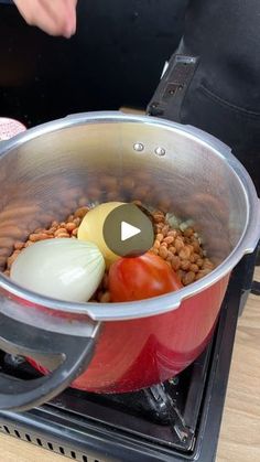 a pot on the stove filled with food