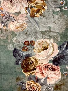 an area rug with flowers and leaves on it