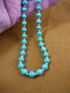 16 inch long Chinese turquoise and gold round Beads bead beaded Necklace jewelry V326-20-16 Cheap Single Strand Round Beaded Necklaces, Cheap Beaded Necklaces With Round Beads, Gold Turquoise Necklace With Round Beaded Details, Gold Turquoise Necklace With Round Gemstone Beads, Handmade Gold Turquoise Necklace With Round Beads, Gold Turquoise Necklace With Polished Beads, Turquoise Beaded Necklace With Gold Round Beads, Spiritual Turquoise Necklace With Spacer Beads, Turquoise Necklace With Round Beads