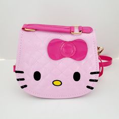 Hello Kitty Little Girl's Bag. -Crossbody Bag With Detachable Strap. -Bag: Size: 6" 3/4 6", 2" Wide -Belt: Approx. 33" Length, 10" Extender -Hello Kitty Logo On The Back. - 4 To 10 Years Old Colors Available: -Light Pink -Gold New Offers Accepted Waterproof Messenger Bag, Hello Kitty Handbags, Hello Kitty Purse, Beg Tangan, Kids Totes, Charmmy Kitty, Hello Kitty Bag, Children Cartoon, Sweet Bags