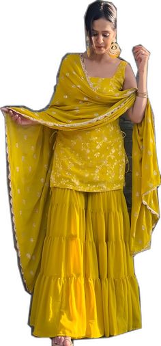 Festival Georgette Sharara For Celebrations, Georgette Sharara For Festivals And Celebrations, Festive Georgette Sharara For Celebrations, Semi-stitched Georgette Sharara For Celebration, Sharara With Dupatta For Celebration, Fitted Sharara With Traditional Drape For Celebration, Yellow Embroidered Palazzo Set For Party, Fitted Sharara For Celebrations And Festivals, Eid Celebration Georgette Sharara