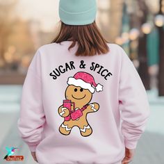 🎄 Get cozy this Christmas with our cute Gingerbread Man sweatshirt perfect for couples! Available in sand, light blue, light pink, and white, this festive sweater spreads holiday cheer. Features a charming Christmas design on the back. The perfect blend of style and comfort for the season! 🌟 Ideal for holiday parties, Christmas morning, and winter festivities. Treat yourself or surprise loved ones with this adorable gift. Don't miss out - grab yours today and celebrate the holidays in style! ? Cute Winter T-shirt For Loungewear, Cute Fleece Hoodie With Crew Neck, Cute Fleece Crew Neck Hoodie, Casual Christmas Fleece Sweatshirt, Pink Winter T-shirt For Loungewear, Casual Holiday Hoodie With Crew Neck, Casual Crew Neck Hoodie As Gift, Casual Crew Neck Hoodie For Holiday, Pink Relaxed Fit Sweatshirt As Gift