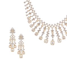 Shine during your special occasions with this designer diamond necklace set, encrusted with 904 round brilliant diamonds (8.23 cts). Stunningly handcrafted in a mix of 18 karat white and yellow gold, the statement necklace secures with a tongue & groove box closure and features an additional extension to adjust the length for a desired fit on the neckline. The matching screw-back tassel drop earrings have a stem thickness of 1.2 mm.Need a size check? Refer to the necklace size guide for assistan Dual-tone Yellow Gold Jewelry For Formal Occasions, Formal Dual-tone Yellow Gold Jewelry, Elegant Dual-tone Gold Jewelry, Elegant Dual-tone Jewelry Sets For Celebration, Elegant Dual-tone Necklaces For Formal Occasions, Elegant Dual-tone Necklace For Formal Occasions, Elegant Dual-tone Formal Necklaces, Elegant Formal Dual-tone Necklace, Elegant Dual-tone Bridal Necklace