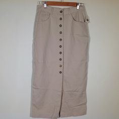 New With Tags New Jay Jacobs Maxi Skirt Womens Junior 9/10 Button Khaki 3 Front Pockets Button Front 100% Cotton 14 1/2 Inch Across Waist 19 1/2 Inch Across Hips 34 1/2 Inch Length E13-09 Cotton Button-up Bottoms, Button-up Cotton Bottoms, Fitted Cotton Skirt With Buttoned Pockets, Beige Button-up Bottoms, Casual Spring Skirt With Button Cuffs, Casual Skirt With Button Cuffs For Spring, Button-up Cotton Skirt With Buttoned Pockets, Cotton Workwear Skirt With Button Zip Fly, Casual Summer Skirt With Button Cuffs