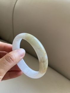 "🌈 Jade Bangle 55.4mm (2.18\"), Round Shape, Icy Light Green + Yellow 🌷 Untreated Natural Jadeite/ Grade A Jade/ Certified 🌷 Jade from Myanmar/ Burma 🌷 100% handmade carving 🌷 Inner diameter : 55.4mm / 2.18\" 🌷 Width & Thickness : 13.7 x 6.5mm 🌷 Shape : Round 🌷 Color : Icy Light Green and Yellow 🌷 Free standard shipping from Hong Kong with tracking included 🌷 Take approximately 7-21 days to arrive worldwide ❤️ In Chinese Culture: Young people wear jade pendant will have a prosperou Carved Round Wedding Bracelets, Wedding Carved Round Bracelets, Carved White Bracelet Jewelry, White Carved Bracelet Jewelry, Carved Round Bracelets For Wedding, White Carved Bracelet, White Carved Bracelets, White Carved Round Bracelet, White Carved Bangle Bracelet