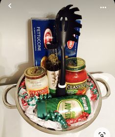 an assortment of condiments in a metal tray