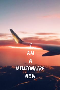 the words i am a millionate now are written on an airplane's wing