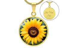 "Unique Personalized Sunflower Necklace!   ➜ Add a touch of sophistication and individuality to your style with our Personalized Stainless Steel and 18k Yellow Gold Finish Sunflower Necklace. This stunning necklace combines sleek stainless steel with a luxurious 18k yellow gold finish to create a modern and eye-catching accessory that will make heads turn.  This Sunflower Pendant Is the Perfect Keepsake! Whether for Yourself or a Loved One. ➜ Each necklace is meticulously crafted with high-quali Yellow Round Sunflower Jewelry, Yellow Flower Shaped Jewelry For Anniversary, Yellow Flower-shaped Jewelry For Anniversary, Yellow Flower Jewelry For Mother's Day, Mother's Day Sunflower Design Jewelry, Yellow Flower Pendant Necklace With Sunflower Design, Yellow Flower Jewelry For Anniversary, Yellow Sunflower Design Flower Pendant Necklace, Yellow Gold Jewelry With Sunflower Design As Gift