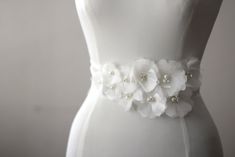 "An accessory to complement your beautiful wedding dress Flowers made of organza. The belt made organza and length is approximately 98\"dimensions, width is 2.7\". All steps were performed obtained. Pearl and rhinestone used in the middle of the flowers . Belt in the photo is the color of ivory. Please feel free to contact for questions and requests. PACKAGE ARE SENT BY FAST SHIPPING COMPANY WITHIN 3 TO 4 BUSINESS DAYS, TO UNITED STATES, TO CANADA, TO UNITED KINGDOM,TO AUSTRALIA AND ALL EUROPEAN Wedding Dress Flowers, Belt Wedding Dress, Beach Wedding Sandals Barefoot, Purple Evening Dress, Wedding Anklets, Summer Beach Wedding, Wedding Dress Belt, Wedding Sash Belt, Wedding Dresses With Flowers