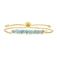 Here's a new twist on the on gemstone bracelet, Our tourmaline gold plated brass adjustable bracelet showcases a neat and sparkling row of wire twisted gems, secured by a box chain that lends a modern, contemporary, clean look. With lariat styling rubber lining to hold the bracelet's fit firm, this bracelet adjusts from 6 inches to 9 inches in length to fit nearly any wrist. Adjustable Bracelets With A Modern Twist As A Gift, Adjustable Bracelets As Gift With A Modern Twist, Adjustable Modern Twist Bracelet As Gift, Adjustable Modern Twist Bracelet, Adjustable Gold-plated Wire Wrapped Jewelry, Adjustable Gold Plated Wire Wrapped Jewelry, Adjustable Yellow Gold Beaded Bracelet With Gemstones, Adjustable Gold Beaded Gemstone Bracelets, Adjustable Yellow Gold Gemstone Beaded Bracelets