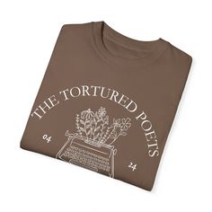 a brown t - shirt that says the tortured pots on it