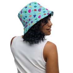 🎩 **All-Over-Print Reversible Bucket Hat** 🌞 Unleash your summer style with our **All-Over-Print Reversible Bucket Hat 🌴 Designed for beach lovers and fashion enthusiasts, this unisex sun hat offers over **300 unique vibrant designs** that stay bold forever.  ✨ **Features - 🌟 **Premium Quality Made of 100% polyester premium fabric - 🌬️ **Breathable & Comfortable Moisture-wicking, breathable fabric with a linen feel - 🔄 **Reversible Design Two stunning looks in one hat - 🔖 **Tear-Away Labe Fun Reversible Sun Hat For Vacation, Reversible Multicolor Bucket Hat For Beach, Fun Reversible Hat, Fun Reversible Hat, One Size Fits Most, Fun Reversible Sun Hat, Fun Reversible Sun Hat With Curved Brim, Fun Adjustable Reversible Bucket Hat, Fun Reversible Hat For Vacation, Fun Reversible Vacation Hat