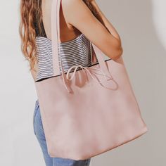 "The perfect everyday bag, designed to ensure that there is adequate space for your essentials (and more). An open-top design, a spacious interior, soft handles and monogramming. It comes with a built-in zipper pocket for your valuables, this Tote's always got your back * Handle drop : 11\" * Height : 13\" * Length : 19\" * Base : 4.5\" * Vegan leather (polyurethane * Monogramming is foil debossed. Color options : Silver or Gold. * Monogramming offered has no text limit, you can get names, title Coworkers Christmas, Staff Gifts, Christmas Gifts For Coworkers, Personalized Tote Bags, Christmas Gift For Her, Gold Monogram, Valentines Day Gifts For Her, Top Design, Everyday Bag