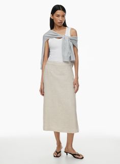 MERIT LINEN SKIRT | Aritzia Linen Midi Skirt For Work, Linen Lined Skirt For Workwear, Linen Skirt For Workwear, Linen Fitted Skirt For Daywear, Fitted Linen Skirt For Daywear, Relaxed Linen Skirt For Workwear, Relaxed Linen Workwear Skirt, Beige Linen Skirt For Daywear, Linen Maxi Skirt For Daywear