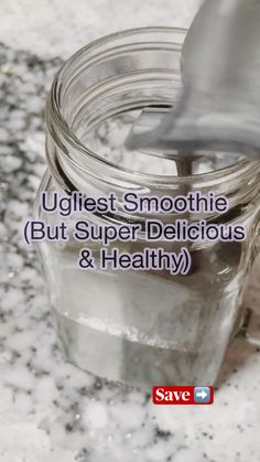 a jar filled with liquid sitting on top of a counter