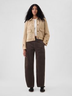 Soft corduroy tapered trousers.  Concealed hook and bar closure, zip fly.  Front slant pockets, back welt pockets.  Fit: Classic.  An easy silhouette that fits close at the waist, and is relaxed through the hips and thigh.  High rise.  Tapered leg.  Models wearing Gap Fall Clothes For Women, Corduroy Pants Outfit, Dark Brown Pants, Ankle Trousers, Pants Outfit Fall, Fall Pants, Androgynous Fashion, Tapered Trousers, Fall Clothes