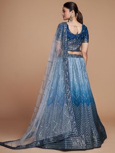 Introducing our stunning "adorable blue sequins chinon sangeet wears lehenga choli with dupatta" - a true masterpiece of ethnic fashion. This exquisite ensemble features a blue color chinon material lehenga with intricate zig zag sequin work, paired with a similar color chinon material choli and a grey color net dupatta, all adorned with matching sequin detailing.
The lehenga is semi-stitched up to 42 inches with a 3-meter flair, while the choli comes with unstitched material for customization. Bridesmaid Lehenga, Net Dupatta, Pink Sequin, Draped Fabric, Lehenga Choli, Ethnic Fashion, Elegant Outfit, Grey Color, Black Sequins