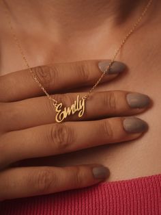 Imagine a necklace that speaks volumes about your love and devotion. Our personalized 14K gold name necklace is more than just an accessory; it's a timeless piece of jewelry that symbolizes your enduring bond. With its elegant design and customizable name, this necklace is a perfect way to express your deep affection and create a lasting memory. Features and Benefits: ✅ Personalized design with your chosen name ✅ Crafted from high-quality 14K gold for durability and shine ✅ Elegant and timeless design ✅ Adjustable chain for a perfect fit ✅ Comes in a beautiful gift box, making it ideal for special occasions ✨-- M A T E R I A L S & F I N I S H --✨ ✅ Crafted from high-quality 925 sterling silver with a 14k gold micron plating or in solid 14k gold. ✅ Available in Rose Gold, White Gold, and Ye Customizable Gold Pendant Necklace, Personalized Name Pendant Necklace, Customized Gold Necklaces For Personalized Gift, Customized Nameplate Necklaces For Anniversary, Customized Yellow Gold Charm Necklaces For Personalized Gifts, Customizable Yellow Gold Round Pendant Necklace, Initial Pendant Name Necklace For Anniversary Gift, Custom Name Pendant Necklace For Anniversary, Customizable Gold Pendant Name Necklace