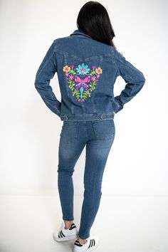 Beautifully embroidered denim jacket for women. Made of slightly faded blue denim, this jacket is fitted to enhance a woman's natural curves, and it hits at about the hips. Blue denim with an embroidered back, the embroidery design shows a Mexican flower motif.  These jackets are very fitted, but are very stretchy and they move with you so you never feel restricted. If you would like a looser look, you need to order the next size. Please wash before first use. Machine wash delicate cycle, cold water. Tumble dry, delicate cycle, remove promptly. Mexican Flower Design, Mexican Flowers, Embroidered Denim Jacket, Riders Jacket, Flower Motif, Jacket For Women, Natural Curves, Embroidered Denim, Bras And Panties