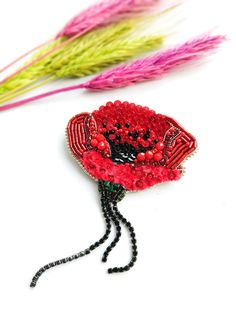 This poppy brooch can brighten your look so easily! Red Flower Brooches For Gift, Handmade Red Flower Brooches, Unique Handmade Red Brooches, Red Handmade Flower Brooches, Red Flower-shaped Brooch With Handmade Flowers, Handmade Red Brooches As Gift, Red Beaded Brooch For Party, Beaded Poppy, Poppy Brooches