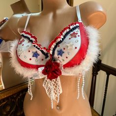 a woman's bra with red, white and blue decorations