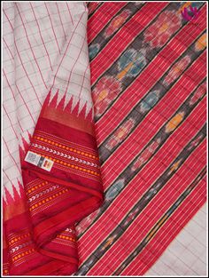 The silk sarees with the top and bottom borders in contrasting colors are called ganga jamuna border sarees. A half white raw silk saree features a natural, textured appearance with two color check patterns on the body and finishes in a detailed pallu with broad stripes and motifs . The red and black ganga jamuna border implies traditional design, where the contrasting colors blend together to create the mesmerizing effect, making it a perfect choice for any occasion. Silk Mark Certified guarant White Tussar Silk Saree With Traditional Patterns, White Silk Handloom Dupatta, White Silk Handloom Traditional Wear, White Traditional Wear With Traditional Patterns In Raw Silk, White Traditional Wear With Raw Silk Patterns, White Silk Dupatta With Border, White Tussar Silk Saree For Traditional Ceremonies, White Traditional Wear With Silk Patterns, White Wedding Saree With Weaving Work