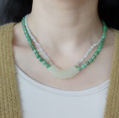 This handmade antique style mint jade Huang (璜) necklace is for a mysterious Asian touch. In the Divine Land, Jade is respected as the emperor of all gemstones. It represents eleven virtues, including a noble character, grace, loyalty, intelligence, and sincerity.⚜ Specifics❀ Mint Jadeite 2-4mm & Faceted Moonstone 2-3mm ❀ Green Jadeite 6mm & Fresh Water Pearl 2mm❀ Mint Jade Huang 0.5" x 1.75" (12m x 45m) ❀ Length 16 in. Green Jade Necklace, 16 Inch Necklace, The Emperor, Jade Necklace, White Jade, Fresh Water Pearl, Green Jade, Jade Green, Antique Style