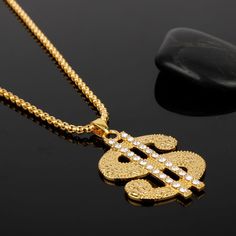 Item Type: Necklace Material: Gold Plated Zinc Alloy+Rhinestones Chain Length: 45 cm / 17.72 inch Pendant Size: 3.1 x 4.3 cm / 1.22 x 1.69 inch Package Includes: 1 piece Dollar Logo, Fortune Symbol, Dollar Symbol, Money Dollar, Stainless Steel Wedding Ring, Artificial Jewelry, Personalized Leather Bracelet, Mens Earrings Hoop, Chain Accessories