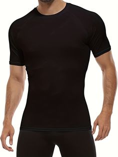 Introducing our Men's 4Pack Solid Stretch Compression Workout Shirts, designed to enhance your performance and comfort during any workout or sports activity. These shirts are made with a high-quality polyester material that provides medium stretch and a skinny fit, perfect for adult athletes all year round. Benefits of our Men's 4Pack Solid Stretch Compression Workout Shirts: Boost your performance with the compression technology that supports your muscles and reduces fatigue Stay comfortable during intense workouts with the breathable and moisture-wicking fabric Look stylish with the solid color design that is perfect for any sports scene Easily care for your shirts with machine wash instructions and enjoy the durability of the knit fabric Experience a flattering fit with the crew neck an Moisture-wicking Short Sleeve T-shirt, Technical Compression T-shirt With Moisture-wicking, Compressive Solid T-shirt For Sports, Functional Black Stretch T-shirt, Black Breathable Dri-fit T-shirt, Breathable Black Workout T-shirt, Fitted Moisture-wicking Solid T-shirt, Fitted Solid Color Moisture-wicking T-shirt, Fitted Solid Moisture-wicking T-shirt