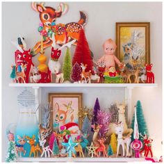 there are many christmas decorations on the shelves in this room, including figurines and deers