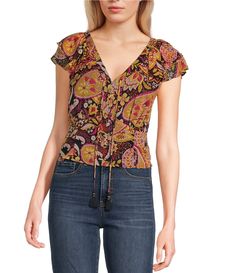 From Jessica Simpson&#x2C; this blouse features:Floral printV-necklineShort flutter sleevesPullover stylingSquare hemPolyesterMachine wash/tumble dryImported. Patterned V-neck Rayon Tops, Summer Viscose Top With Flutter Sleeves, Viscose Flutter Sleeve Tops For Summer, Casual Flutter Sleeve Rayon Tops, Casual Rayon Tops With Flutter Sleeves, Viscose Top With Flutter Sleeves For Summer, Printed Viscose V-neck Top, Fall Printed Short Sleeve Blouse, Fall Season Printed Short Sleeve Blouse