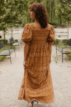 You'll be sweet as honey in our Honey Dress in Brown Lace! This embroidered beauty features a sweetheart neckline with playful ruffle detailing, half-length puff sleeves, and a maxi-length skirt. With a hidden side zipper and functional drawstrings, this women's dress is practical, stylish AND maternity friendly. Crafted with non-stretch fabric, so we recommend sizing down 1 size if you're in between sizes. Fall Sundress, Honey Dress, Earth Tone Dress, Sweet As Honey, Beauty Features, City Woman, Dresses Aesthetic, Women's Dress, Fall Dresses