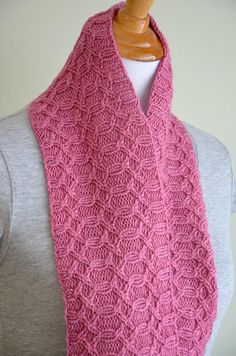 "**This listing is for the purchase of a KNITTING PATTERN only, not the actual finished item.** You will receive a pdf download with instructions on how to make your own item. A cabled cowl reminiscent of the gates surrounding the Victorian gardens of my favorite historical homes. SIZES Adult. One size. YARN approx. 250 yds of worsted wt. yarn. sample shown using Camelot Dyeworks Merlin in 'Mulberry' (100% superwash merino; 100g = 210 yds), 2 skeins NEEDLES 32\" circular knitting needle in US 8 Infinity Scarf Knitting Pattern, Historical Homes, Victorian Gardens, Cowl Knitting, Cable Scarf, Cowl Knitting Pattern, Knitting Needle, Scarf Knitting Patterns, Pdf Knitting Pattern