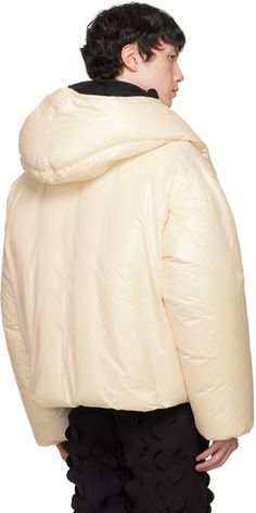 Down-filled polyester taffeta jacket. · Bungee-style drawstring at hood · Stand collar · Two-way zip closure · Embroidered detailing at front · Zip pockets · Concealed bungee-style drawstring at hem · Elasticized cuffs · Welt pocket and patch pockets at interior · Full fleece and taffeta lining Supplier color: Cream Fill: 100% goose down. Cream Nylon Outerwear For Spring, Spring Cream Nylon Outerwear, Beige Nylon Outerwear With Drawstring Hood, White Hooded Nylon Parka, Cream Nylon Hooded Outerwear, Cream Hooded Nylon Outerwear, Beige Nylon Outerwear With Double-lined Hood, Cream Hooded Puffer Outerwear, White Nylon Puffer Jacket With Double-lined Hood