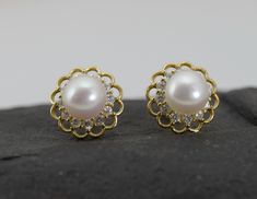 Material               : Genuine Natural White Freshwater Pearls with 925 Gold Posts  Quantity              : One Pair Earring Color                    : Natural White Pearls with high luster Pearl Shape         : Round Button Pearls Pearl Size             : 8mm approx. Earring Size         : 13mm approx.  *Due to the pearls are naturally grown, they won't be identical to each other* Lead Time & Shipping :  We ship your order in 1-2 business days (Mon-Fri).  If we offer FREE DOMESTIC shipping, package will be shipped via USPS First Class mail on orders shipping within the U.S. W H O L E S A L E    I N Q U I R Y :- Please convo us at anytime if you need to purchase in Wholesale Quantity and Custom Made Orders.  We will be very happy to assist you at our earliest convenience. Classic Flower-shaped Pearl Earrings For Formal Occasions, Classic Pearl Drop Flower Earrings Gift, Flower Shaped Pearl Drop Jewelry For Anniversary, Flower-shaped Pearl Drop Jewelry For Anniversary, Yellow Gold Flower Earrings With Pearl Drop For Wedding, Classic White Flower Earrings For Formal Occasions, Wedding Yellow Gold Flower Earrings With Pearl Drop, White Flower Earrings With Prong Setting For Formal Occasions, Elegant Round Flower Earrings Hallmarked