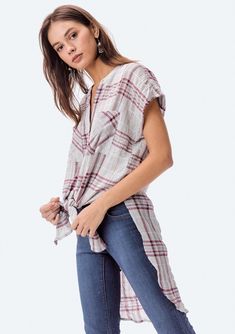 Short sleeve, plaid button-down tunic. Tie it up or wear it long! FINAL SALE Yarn dye plaid Relaxed fit Short cap sleeves Long tunic length Rounded shirttail hemline High side vents Round neckline Button front Double bust pockets 99% Cotton, 1% Spandex Model is 5'9, wearing a size S.Style: I-11596W-PSC-YD Plaid Button-up Tops, Casual Plaid Tops For Layering, Casual Plaid Top With Shirttail Hem, Fall Button-up Casual Tunic, Casual Shirttail Hem Tunic For Daywear, Short Sleeve Tunic For Daywear In Fall, Short Sleeve Tunic For Fall Daywear, Casual Tunic With Shirttail Hem For Daywear, Fall Daywear Tunic With Shirttail Hem