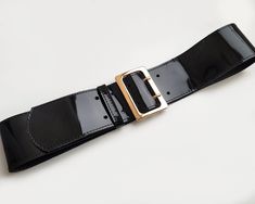 This extraordinary wide leather belt is made of black colour natural patent leather. It will look very luxurious on your waist and will perfectly complement any party or event outfit.  Main colour: Black  Material: Natural leather  Silver or gold colour metal buckle- choose the option in drop menu. Wide- 6.5 cm ( ~2,5 inch)   Waist circumference: 1. Waist 23.6 - 28,3 inch (60 - 72 cm); 2. Waist 27.6 - 32,3 inch (70 - 82 cm); 3. Waist 31,5 - 36,2 inch (80 - 92 cm) ! ! ! Please do not go by your p Wide Waist Belt, Nice Belts, Wide Leather Belt, Suede Belt, Event Outfit, Wide Waist, Faux Leather Belts, Suspender Belt, Leather Silver