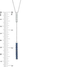 Instantly dress up your evening attire with the tasteful look of this fabulous lariat-styled necklace. Crafted in sterling silver, this fashionable choice captivates with a bar of sparkling lab-created white sapphires at the "Y" connect and a larger bar of lab-created bright blue sapphires that dangles below. Buffed to a brilliant luster, this chic 36.0-inch rope chain necklace secures with spring-ring clasp. Elegant Blue Lariat Necklace, Elegant Blue Sterling Silver Lariat Necklace, Elegant Blue Lariat Necklace With Adjustable Chain, Lariat Style Necklace, Rope Chain Necklace, Peoples Jewellers, Evening Attire, White Sapphire, A Bar