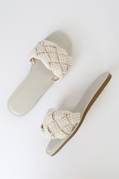 The Lulus Avalon Ivory Pearl Braided Flat Slide Sandals will help you slide into summer with a fresh new look! Sleek faux leather shapes these cute sandals with a square footbed, an open-toe upper, and an easy-to-slide-on design. Shiny faux pearls top a woven braided vamp with sheer mesh fabric. 0. 5" Rubber Heel. Cushioned Insole. Felted Rubber Sole Has Nonskid Markings. Man Made Materials. Imported. Lulus | Avalon Ivory Pearl Braided Flat Slide Sandal Heels | Size 10. White Open Toe Slides With Textured Footbed, White Textured Summer Slides, Spring Woven Synthetic Slides, White Low-top Synthetic Slides, Cream Textured Open Toe Slides, Ivory Sandals, Pearl Sandals, Braided Sandals, Size 11 Heels